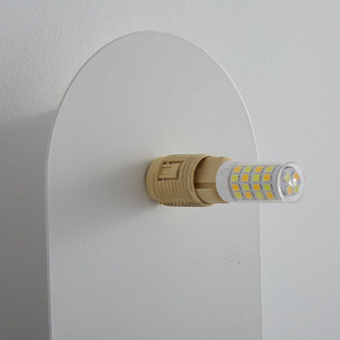 Valença wall sconce angled view detailing the oval wall plate and the opal glass globe