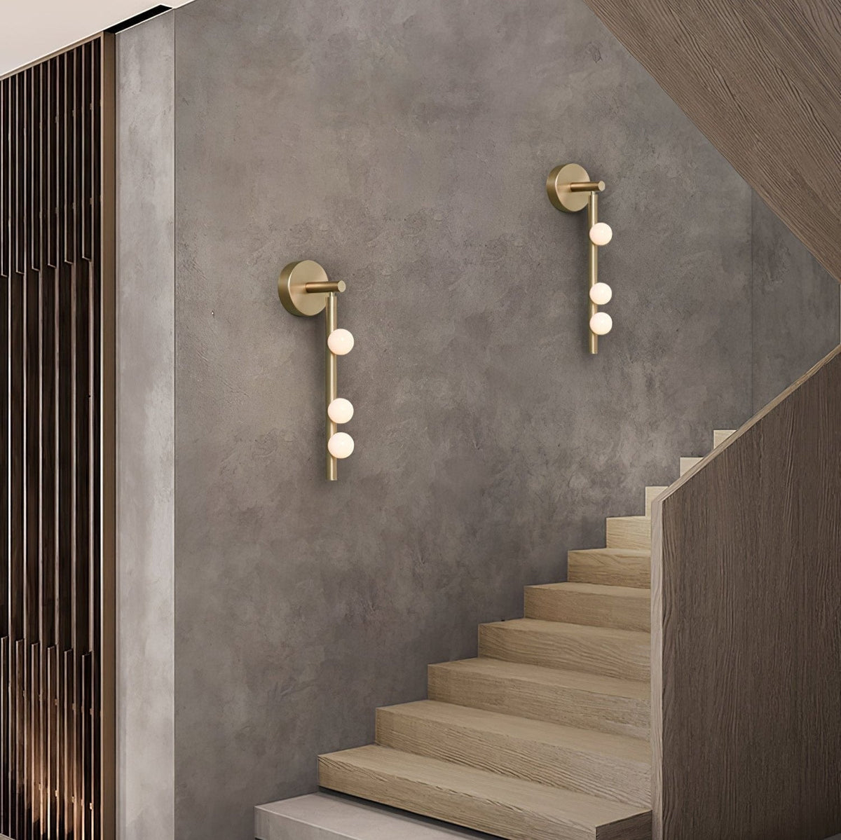 Vouga six-head wall sconce in polished brass
